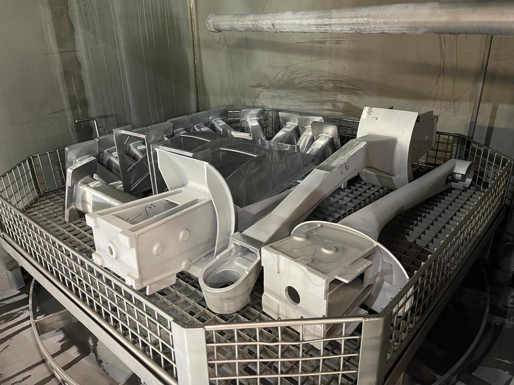 Parts in a large auto aqueous part washer