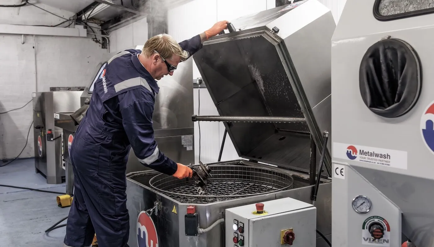 Parts washers being serviced in a worksop