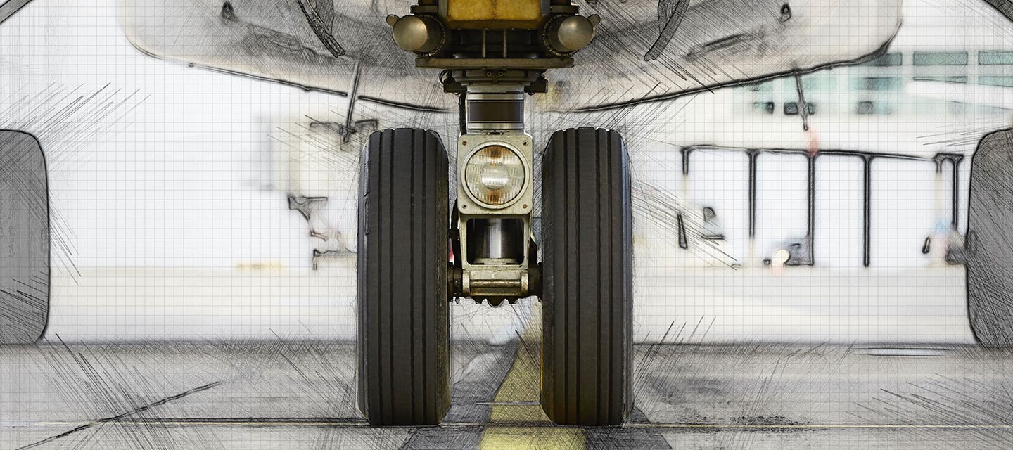 Close-up of aircraft wheels on the ground