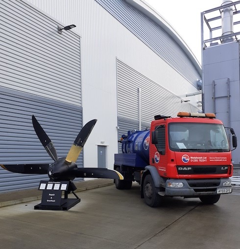 Metalwash truck outside Aerospace facility