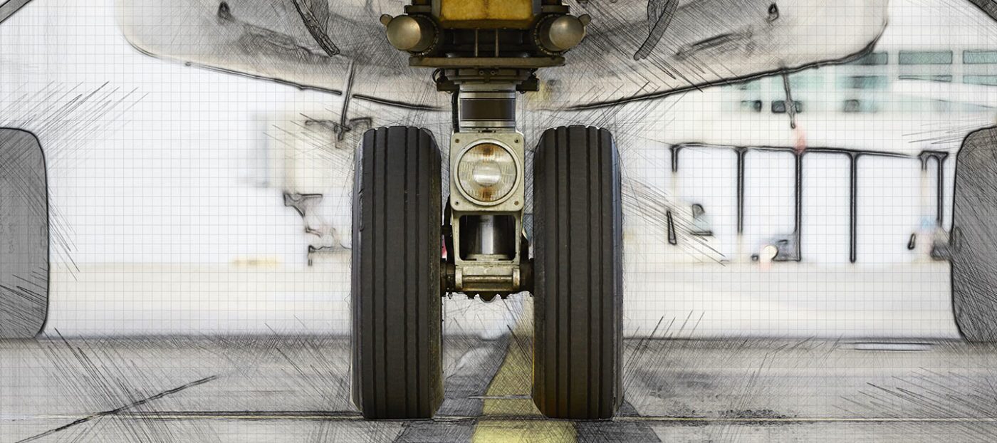 Close-up of aircraft wheels on the ground