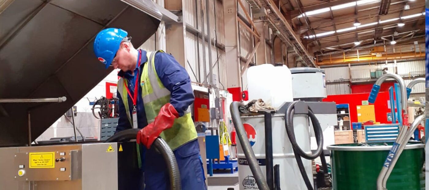 Engineer pumping a customers machine
